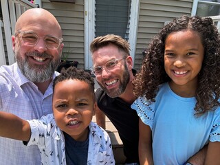 Family Celebrating New Home Purchase