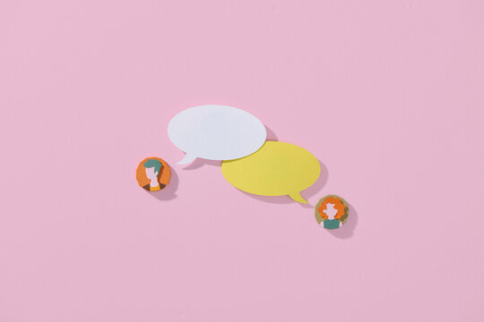 Minimalist Conversation With Speech Bubbles On Pink Background