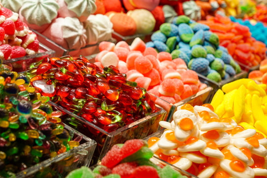 Colorful candy assortment at market in Barcelona, Spain, sweets shop stall