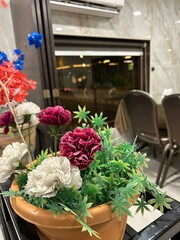 A vibrant bouquet blooms with a symphony of colors, each flower a delicate note of nature's melody, capturing the essence of beauty and grace in every petal.