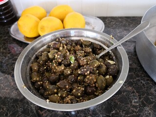The delicious black olives bowl