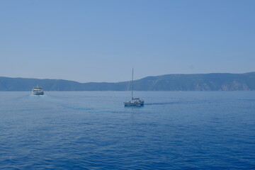 Obraz premium Croatia sailboat and ferry on blue Adriatic sea