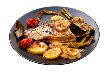 Delicious grilled dorado or sea bream fish with salad, spices, grilled dorada on a black plate.