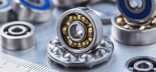 different bearings on a metal background. Part of mechanism.
