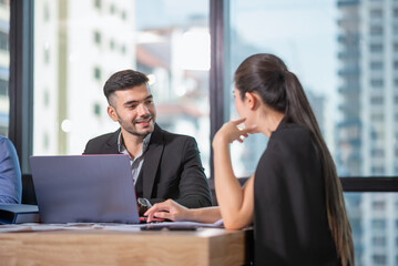 Portrait of businesspeople meeting to be discussing business plan