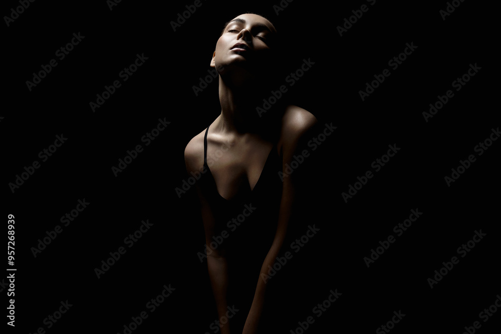 Wall mural Sexy Woman silhouette in dark. Beautiful Body Girl