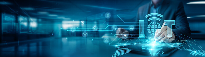 IOT. Businessman drawing global structure networking of the Internet of Things (IoT) graph on office table with tab, illustrating interconnected devices, data flow, enhance efficiency and connectivity