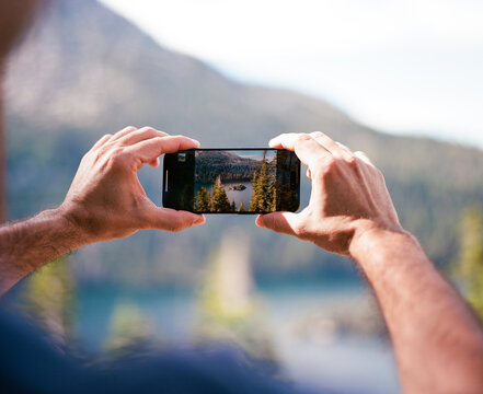 Man Taking a Picture with a Phone