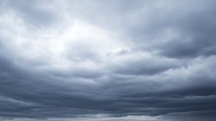 Overcast sky with dark clouds threatening rain, gloomy weather, moody atmosphere