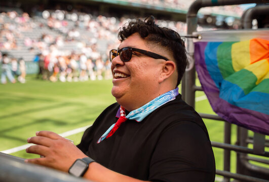 Sports Fan Interacts at Game 