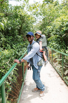 Father and Son Hiking in Costa Rican Jungle
