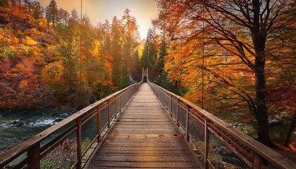Puente sobre un r&iacute;o que cruza un bosque oto&ntilde;al