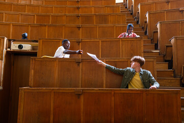 Students sharing documents at university
