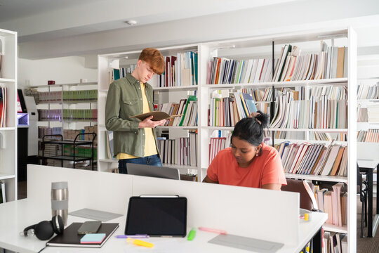 Busy students at university library