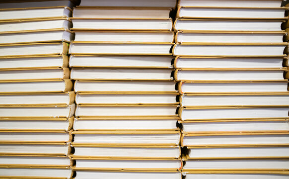 Close up view of stacked books 