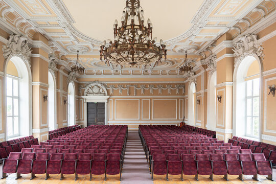Spacious concert hall with many rows of seats