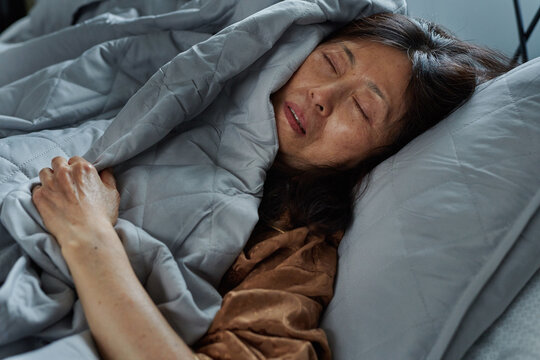 Restful: Senior Asian Woman Sleeping 