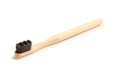 Bamboo tooth brush on white background
