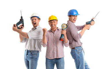 Team of male builders with tools on white background