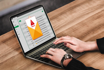 Fototapeta premium Cyber attacking concept. Malware alert showing on computer screen display scam and threat detection on computer system or online server to be removed snugly.