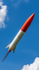 Fototapeta premium Rocket Launch Against Blue Sky