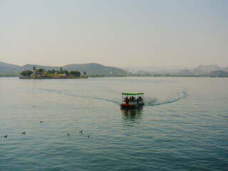 Scenic view of tourist boat on lake in  Udaipur 