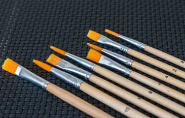 Fototapeta premium Shot of the different painting brushes with sizes marking on them. Art and craft