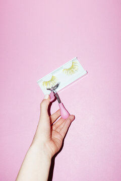 Fake lashes/lash extensions and eyelash curler with hard direct flash 