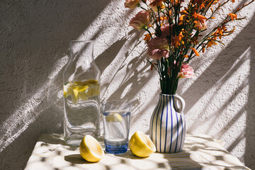 Water with lemon on a hot summer day