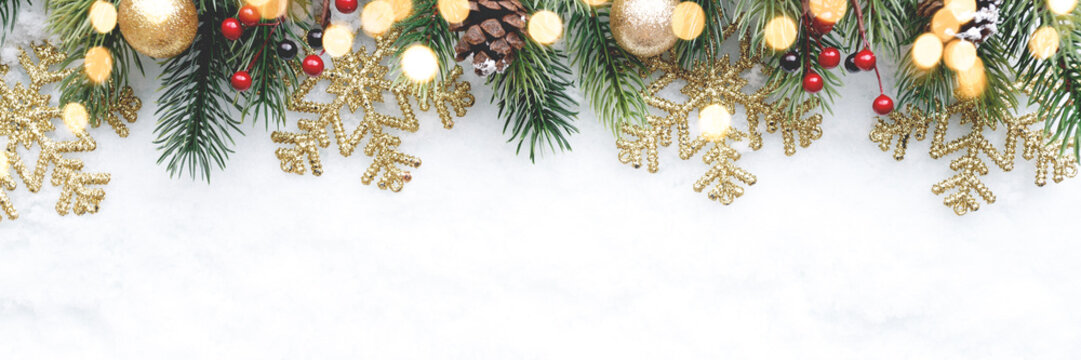 Christmas fir tree with decoration on snow background, flat lay