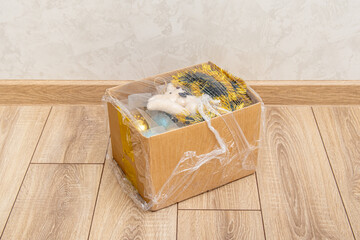 Christmas decorations and toys in box. Storage of Christmas tree toys. Box of old toys