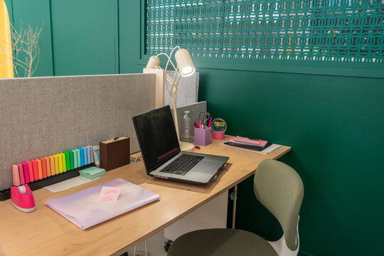 Organized Desk in Coworking Space - Powered by Adobe