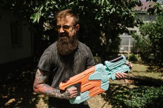 Man with water gun
