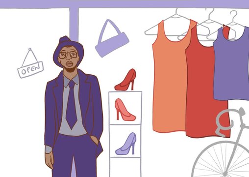 A Clothing shop owner in front of his store