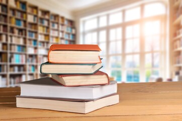 Set of reading books on table in library, education