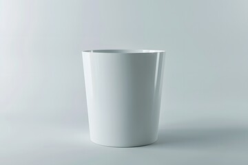A 3D render of a white, sleek wastepaper basket on a plain, isolated background.
