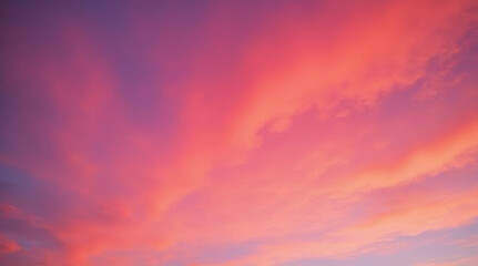 Fototapeta premium Panoramic Sunset Sky with Vibrant Orange and Pink Clouds - Dramatic Twilight Cloudscape Background for Nature, Landscape, and Weather Design Projects
