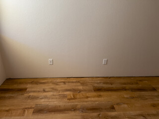 Newly Installed Vinyl Plank Flooring in Empty Room