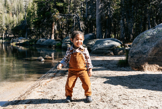 Toddler Throwing Rocks at Tenaya Lake