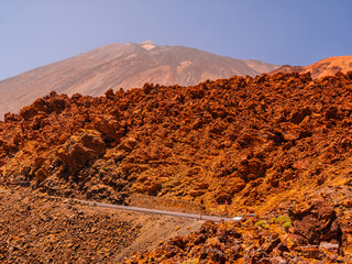 spot in Tenerife with many red rocks and beautiful mountain landscape background