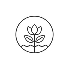 Fototapeta premium A stylized line drawing of a flower growing in soil within a circle
