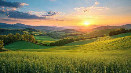 Fototapeta premium Scenic countryside with rolling hills and a sunset