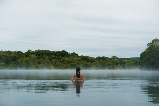 Woman Bathing in a Misty Lake