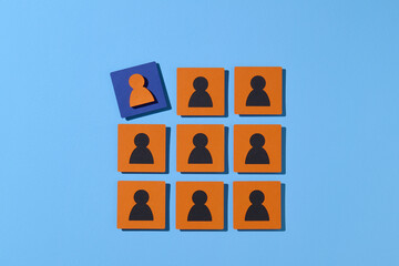 Unique Person Among Group of Identical Figures