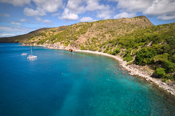 Aerial Drone photos of a sunken shipwreck off the coaast of St. Kitts in clear, tropical water