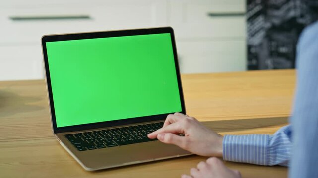Online student studying mockup laptop in apartment closeup. Unknown woman hands 