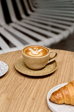 Latte and a croissant