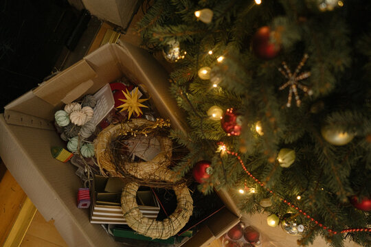 The process of decorating a Christmas tree