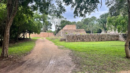 Mayan city ruins in the middle of a jungle 