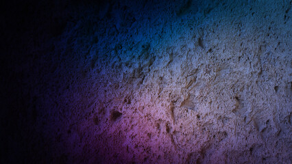 Textured stone wall with a gradient of blue and purple hues, perfect for 4K backgrounds, wallpapers, and banners, adding a rustic and moody ambiance